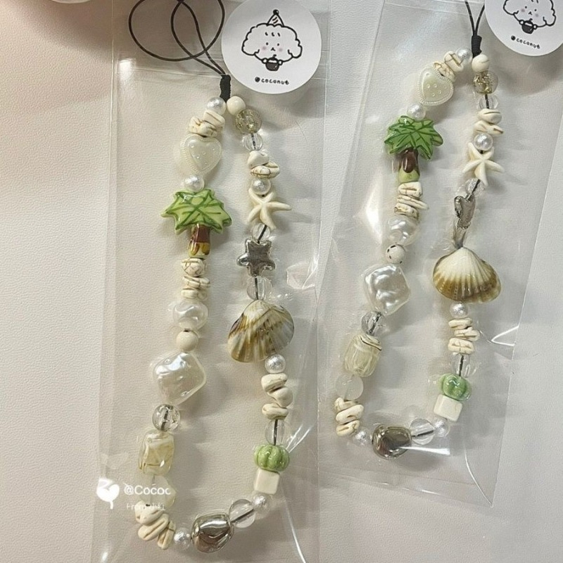 Yazlık Deniz Kabuğu Boncuklu T - Camera Wrist Strap incelemesi ve fiyatı